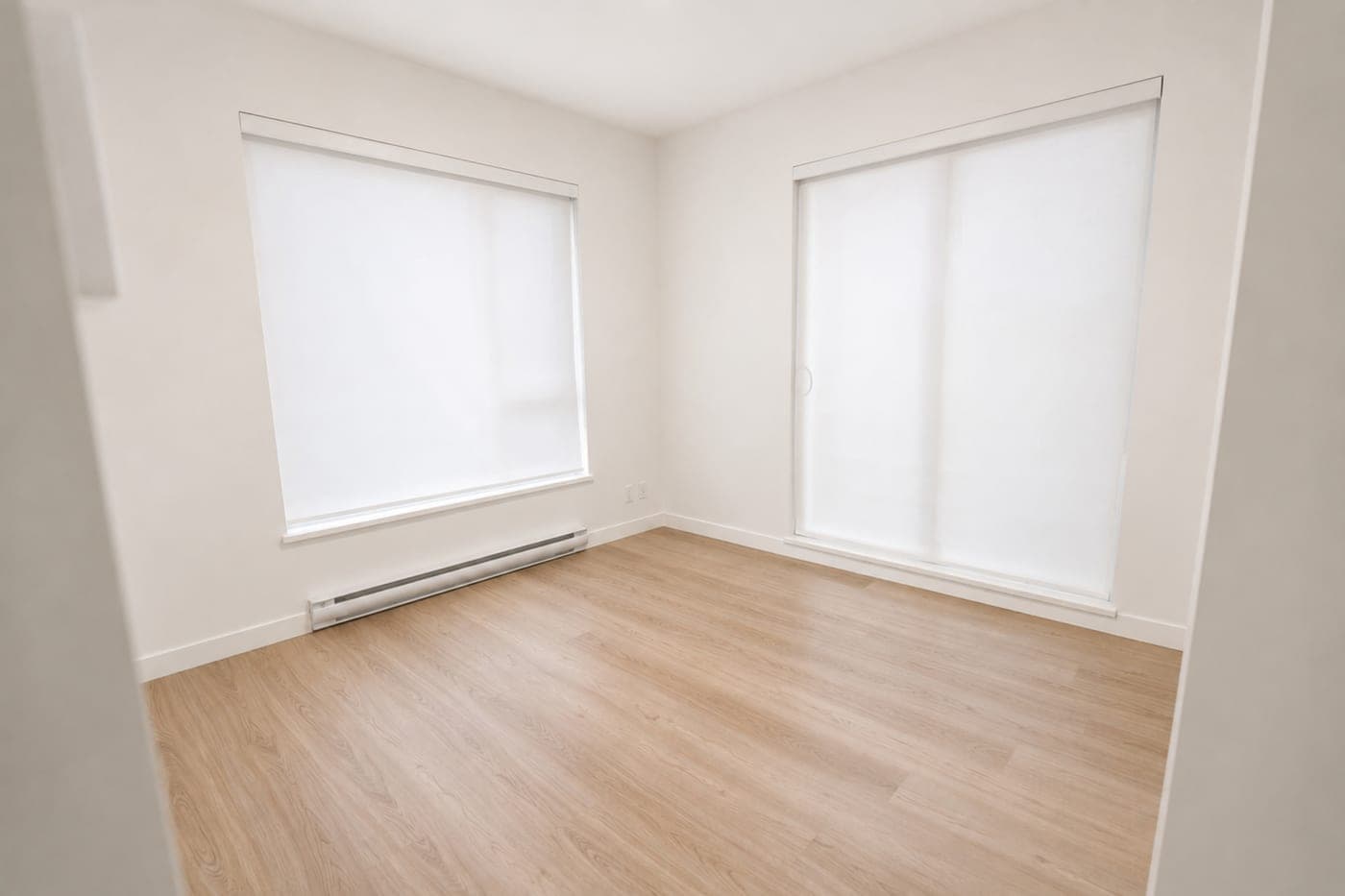 Bedroom with a sliding door — empty room, before staging